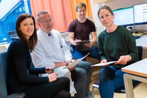 Gruppenfoto mit den vier Teammitgliedern