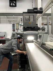 Man in front of a machine