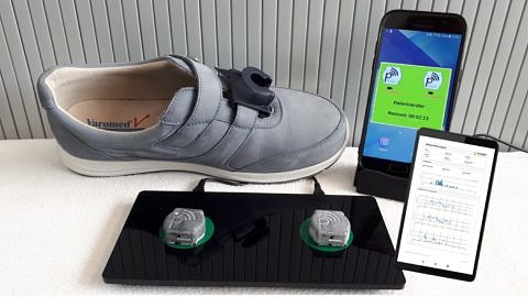 Schuh, Handy und Sensorsystem.