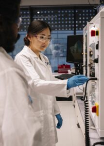 Female researcher working with equipment