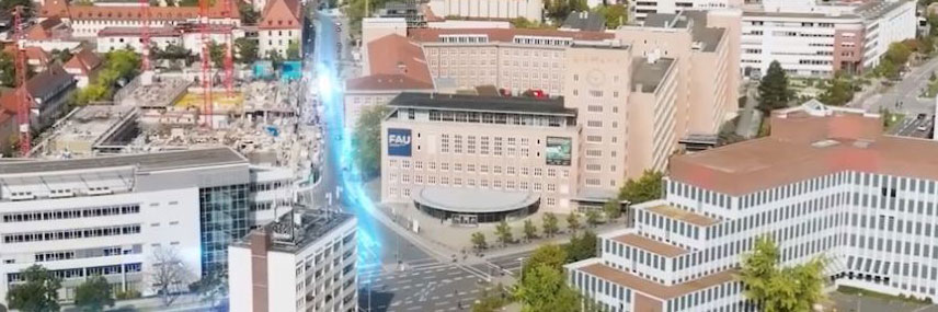 Erlangen von oben. Markierung wo die Stadtumlandbahn neben dem Geistes- und Sozialwissenschaften der FAU fahren würde. Screenshot: https://www.stadtumlandbahn.de