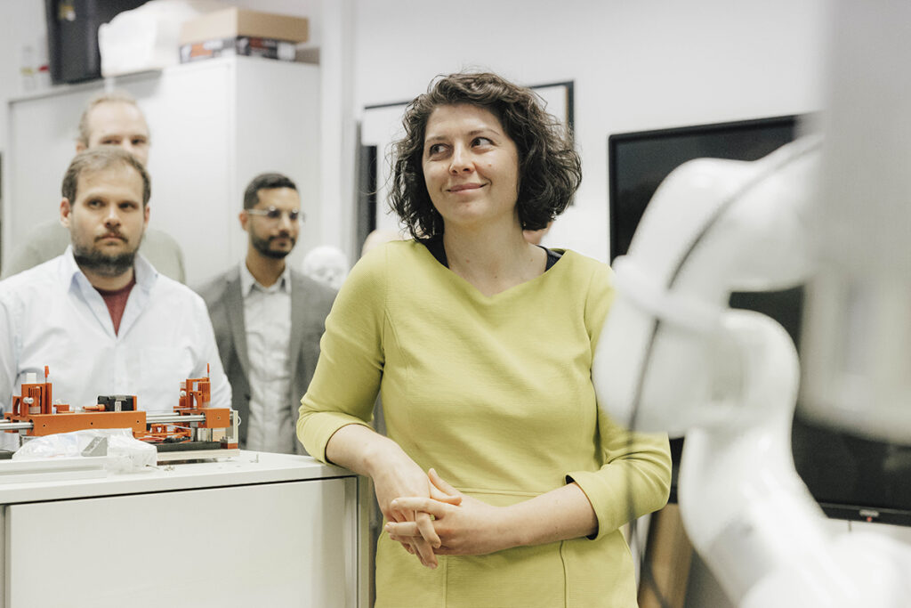 Prof. Dr. Mathis-Ullrich is smiling at a person outside the frame.