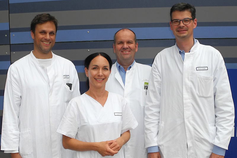 Das Team der Erlanger Huntington-Ambulanz (v. l. n. r.): Dr. Franz Marxreiter, Susanne Seifert, Prof. Dr. Jürgen Winkler und PD Dr. Zacharias Kohl. (Bild: Uni-Klinikum Erlangen)