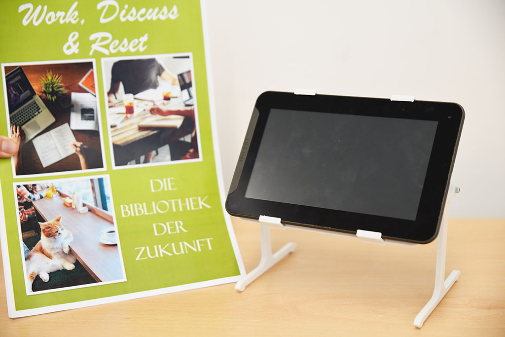 Prototyp eines Smarttables und im Hintergrund ein Konzept