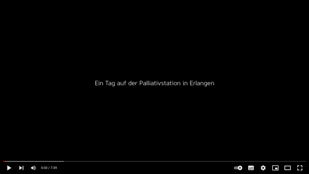 "Ein Tag auf der Palliativstation in Erlangen" Text auf schwarzem Grund