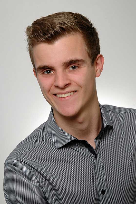 Porträtfoto von Kevin Rösch.