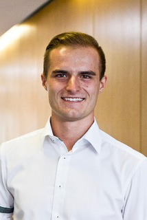 Porträtfoto von Erik Hausecker.